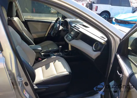 2016 Toyota Rav4 Hybrid Limited z USA, uszkodzony, nr VIN JTMDJREV2GD012869